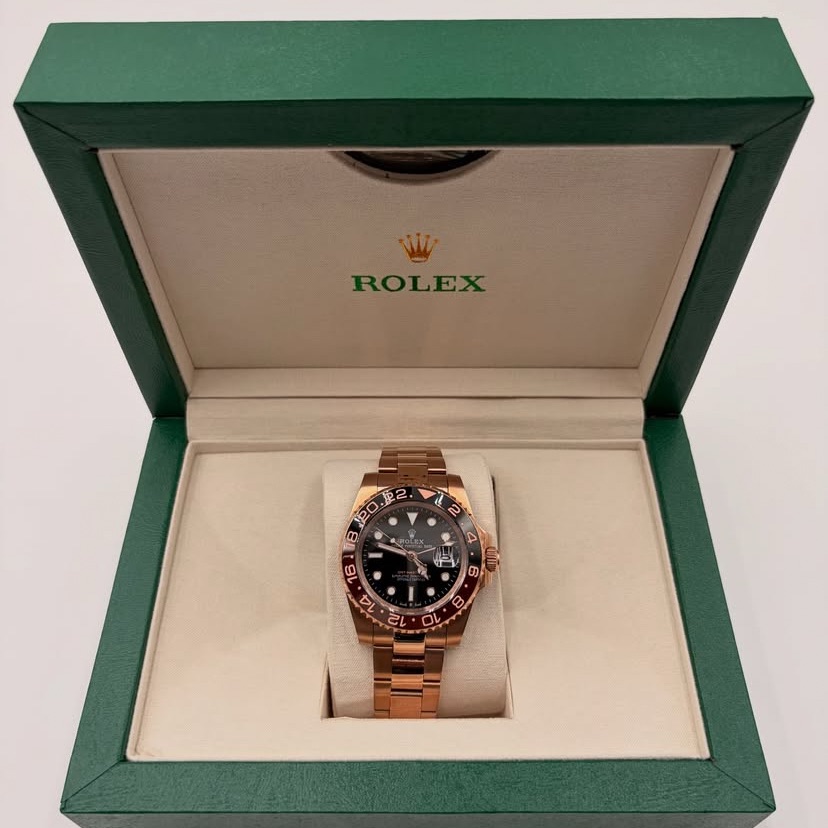 rolex rose gold and black watch